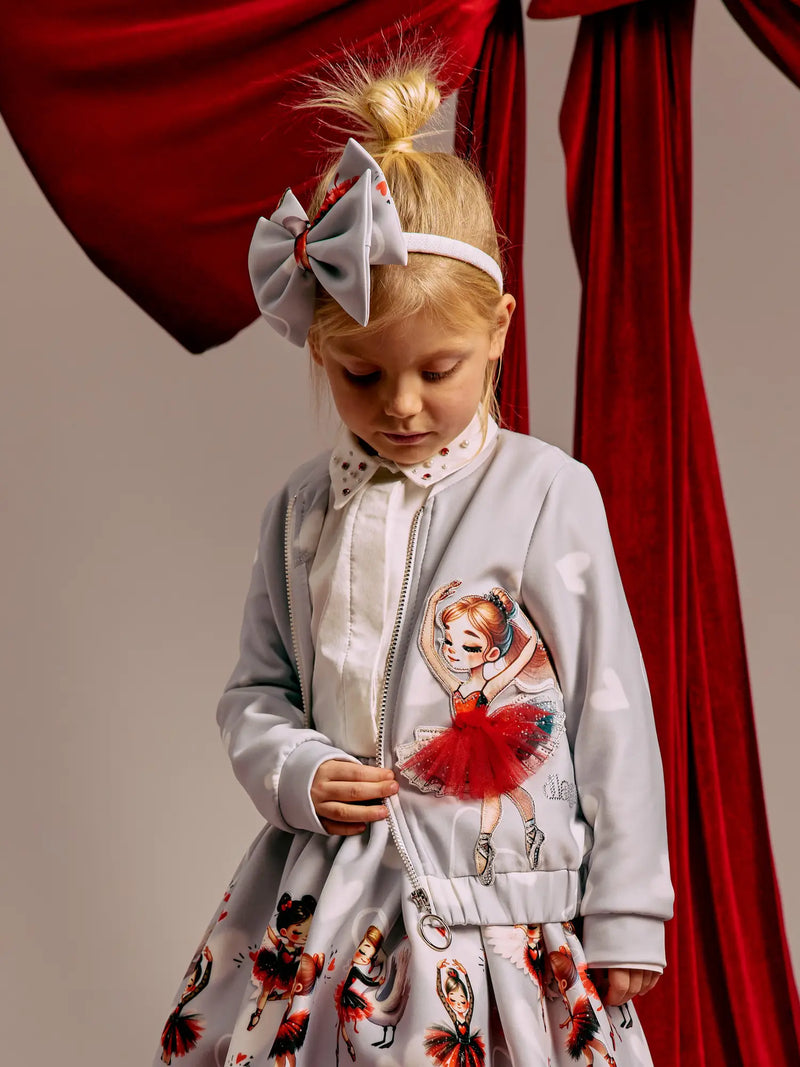 Girl wearing the Daga ballerina jacket.