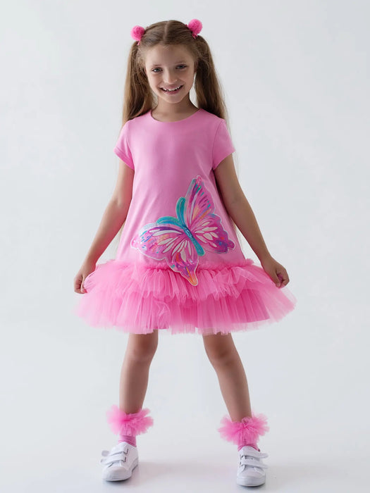 Girl modelling the Daga butterfly tutu dress.