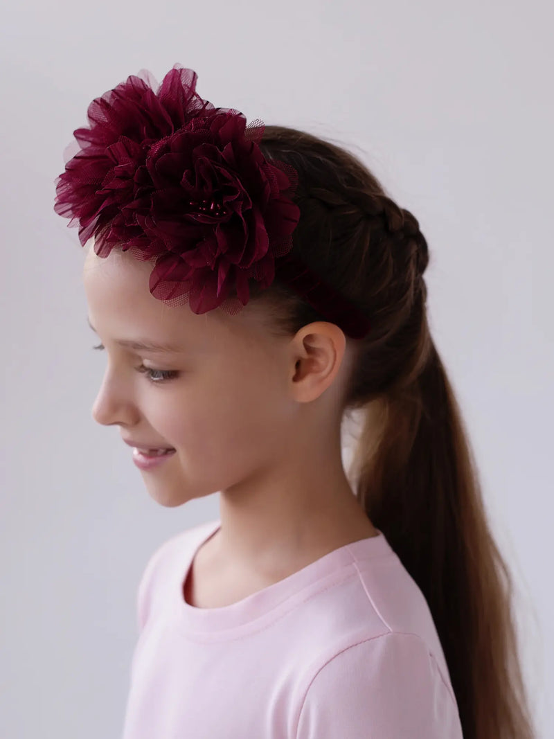 Closer view of the Daga flower headband.