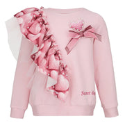 Girl's pink sweatshirt by Daga.