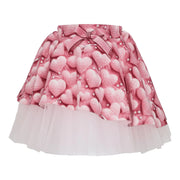 Pink heart print skirt.
