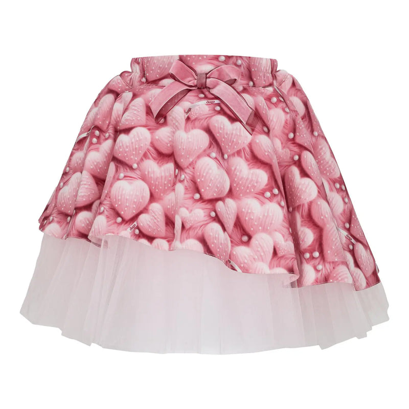 Pink heart print skirt.