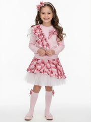 Girl wearing the Daga heart print skirt set.