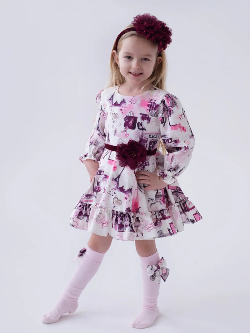 Girl modelling the Daga printed dress.