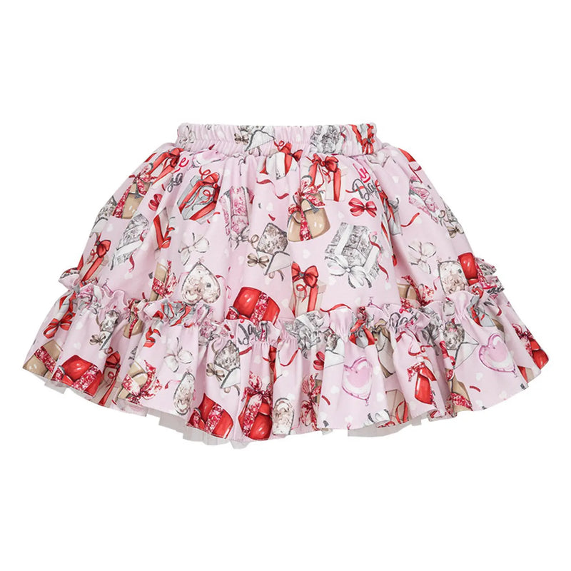 Girl's pink frilled skirt.