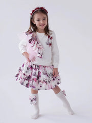 Girl modelling the Daga skirt set.