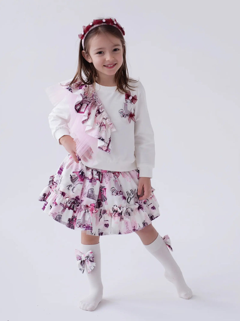 Girl modelling the Daga skirt set.