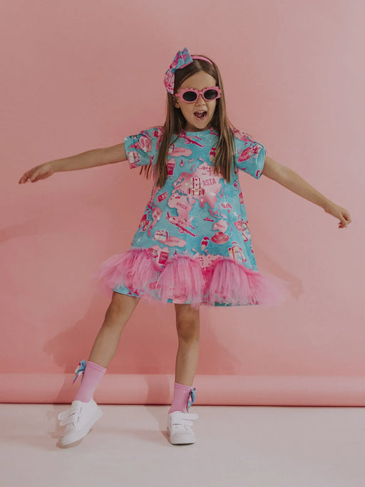 Smiling Girl modelling the Daga sugar trip dress.