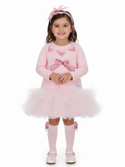 Smiling Girl modelling the Daga tulle dress.