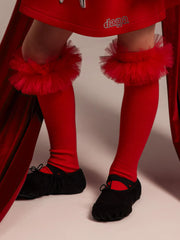 Girl modelling the Daga tulle knee socks.
