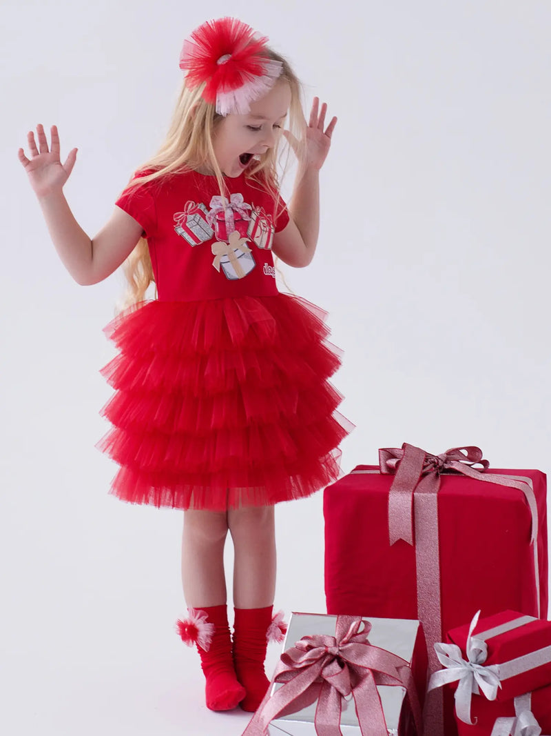 Smiling Girl modelling the Daga tutu dress.