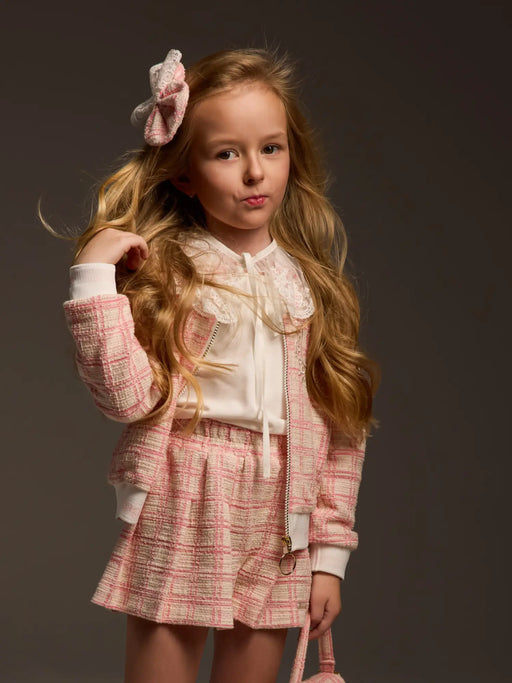 Girl modelling the Daga tweed jacket.
