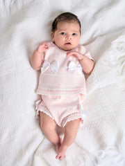 Baby girl wearing the Dandelion bow bloomer set.