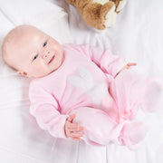 Girl wearing the Dandelion bunny babygrow.