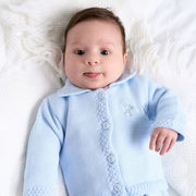 Baby boy wearing the Dandelion bunny cardigan.