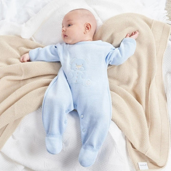 Boy wearing the Dandelion teddy bear babygrow.