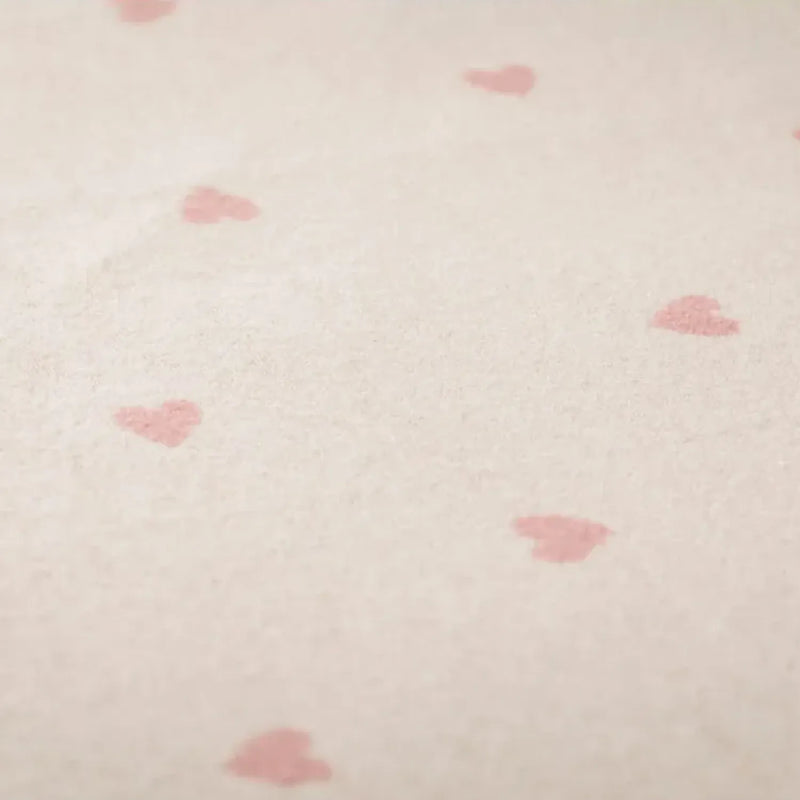 Closer look at the David Fussenegger juwel blanket showing detail of the pink heart pattern.