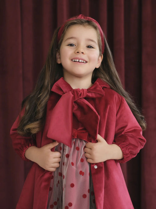 Girl modelling the Deolinda velvet jacket.