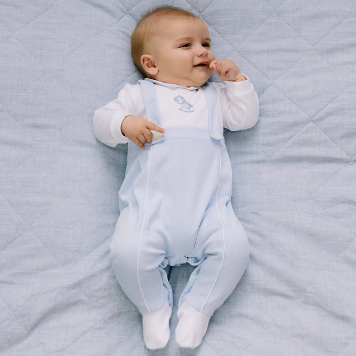 Boy wearing the Emile et Rose fergus babygrow.