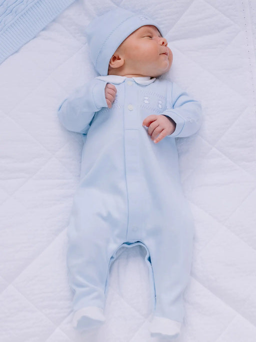 Baby boy wearing the Emile et Rose fisher babygrow.