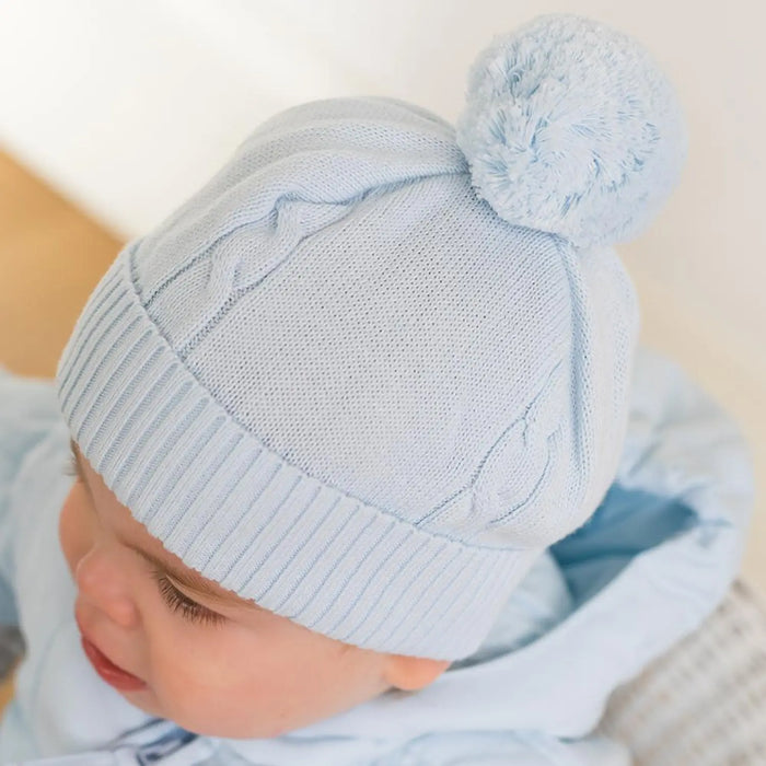 Emile et Rose blue hat with cable knit design.