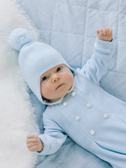 Baby boy wearing the Emile et Rose kenton bobble hat.
