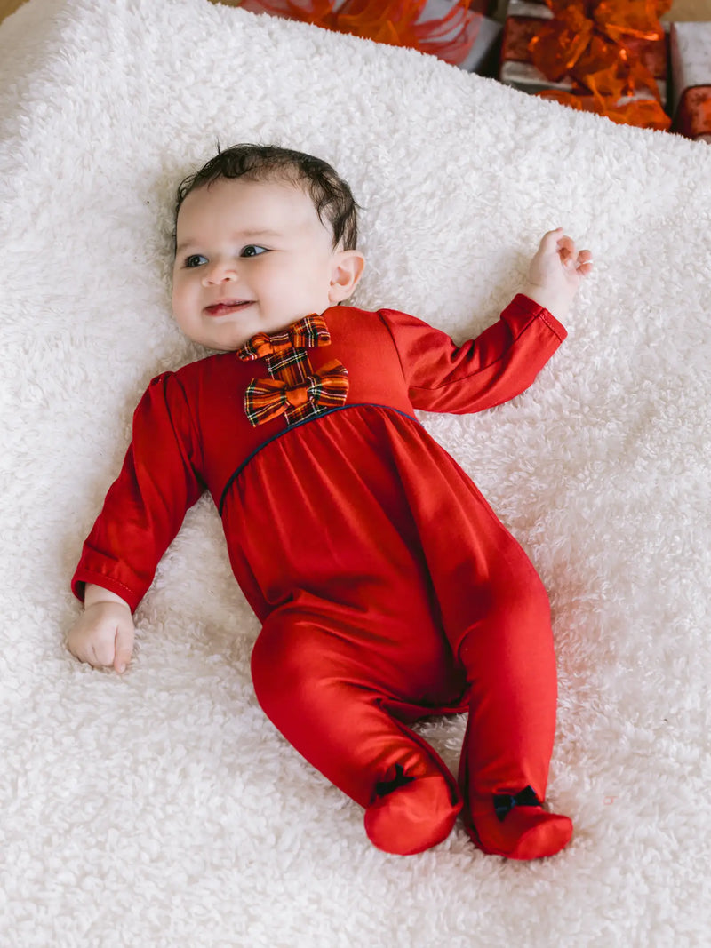 Emile et Rose kiki babygrow with tartan bows on the chest.