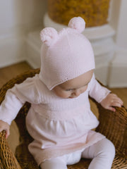Baby girl wearing the Emile et Rose kirsty bobble hat.