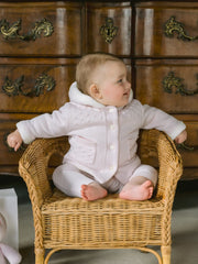 Baby girl in pink kitty jacket by Emile et Rose.