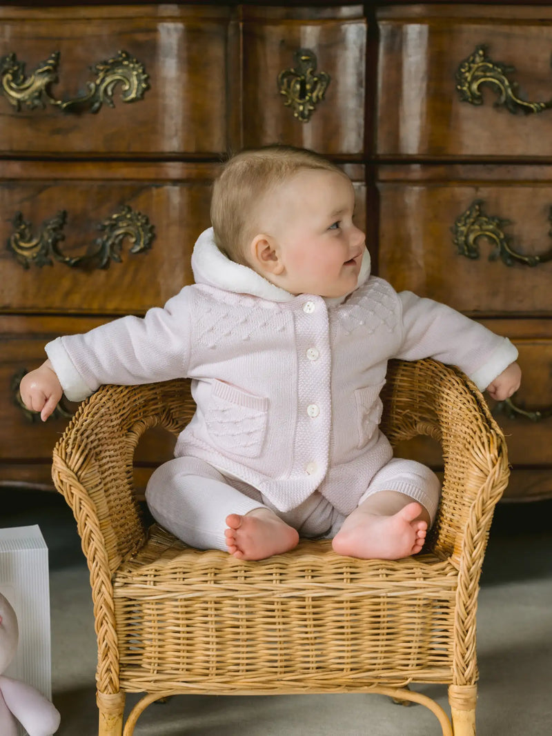 Baby girl in pink kitty jacket by Emile et Rose.