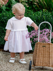 Baby girl modelling the Emile et Rose lauren dress.