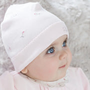Baby girl in pink linzi hat by Emile et Rose.