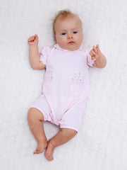 Baby girl wearing the Emile et Rose louise romper.