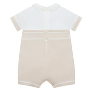 Back of the Emile et Rose beige lowe romper.
