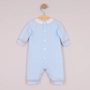 Rear view of the Emile et Rose blue milo romper.
