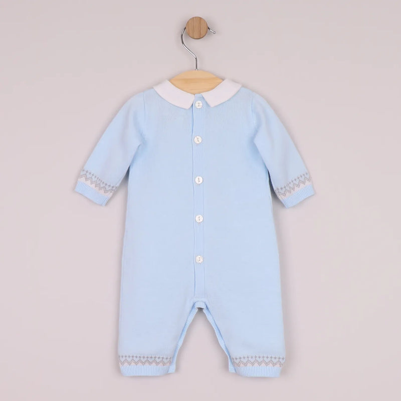 Rear view of the Emile et Rose blue milo romper.