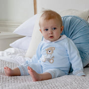 Baby boy wearing the Emile et Rose milo romper.