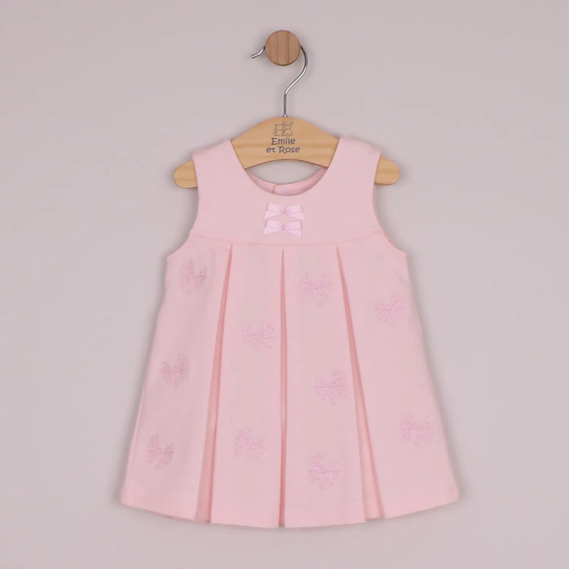 Baby girl's pink pinafore. 
