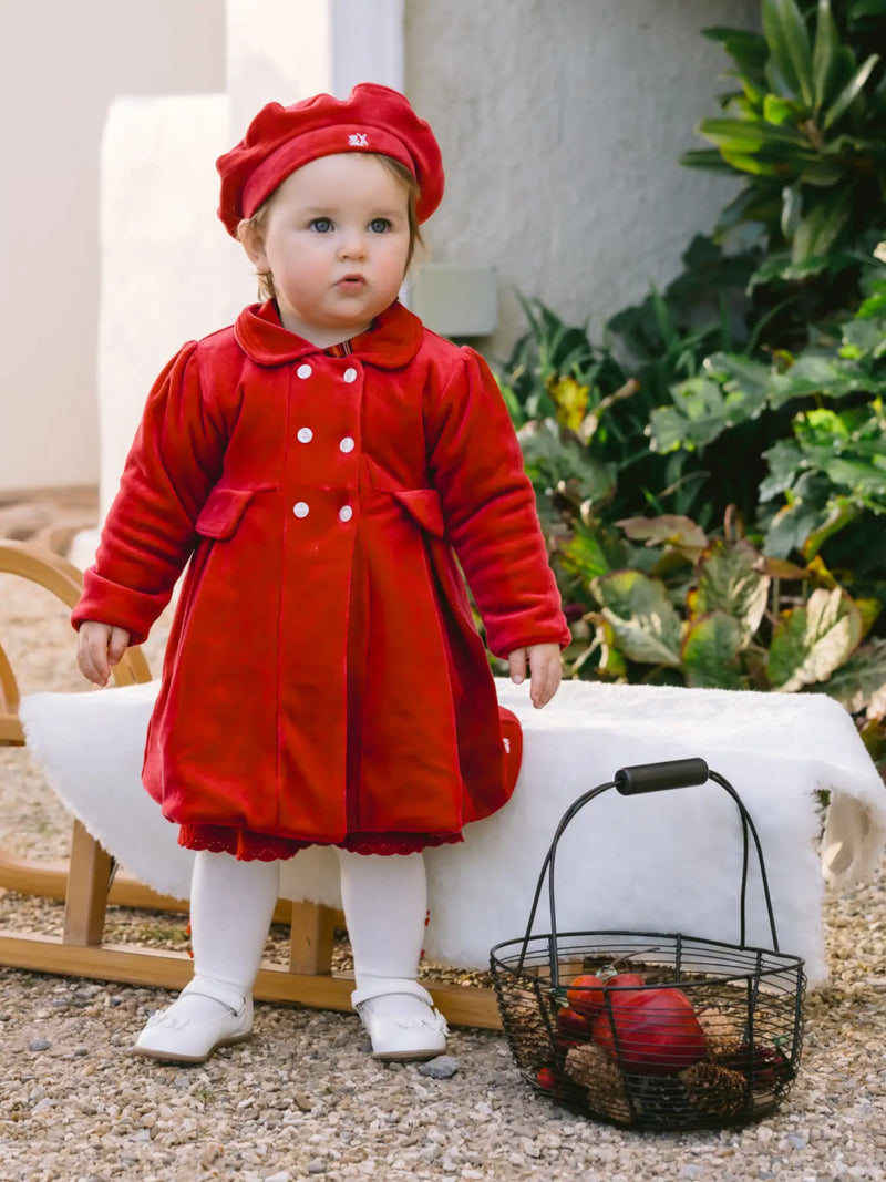 Baby girl wearing the Emile et Rose rosana coat.