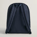 Back of the GANT navy archive shield backpack.