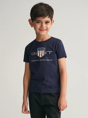 Smiling boy wearing the Gant Archive Shield T-Shirt.