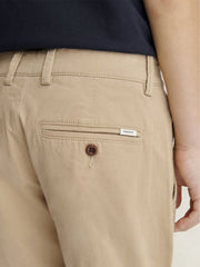 Closer look at the GANT chinos showing detail of the logo tab on the back pocket.
