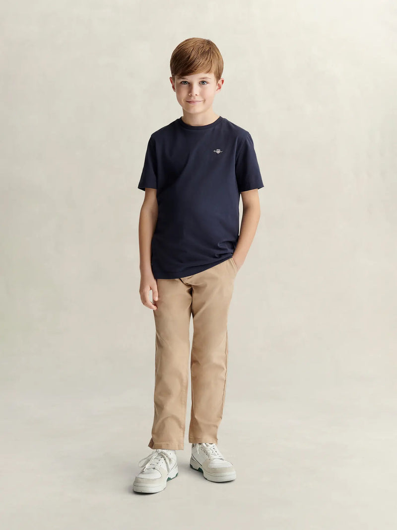 Boy wearing the GANT chinos.