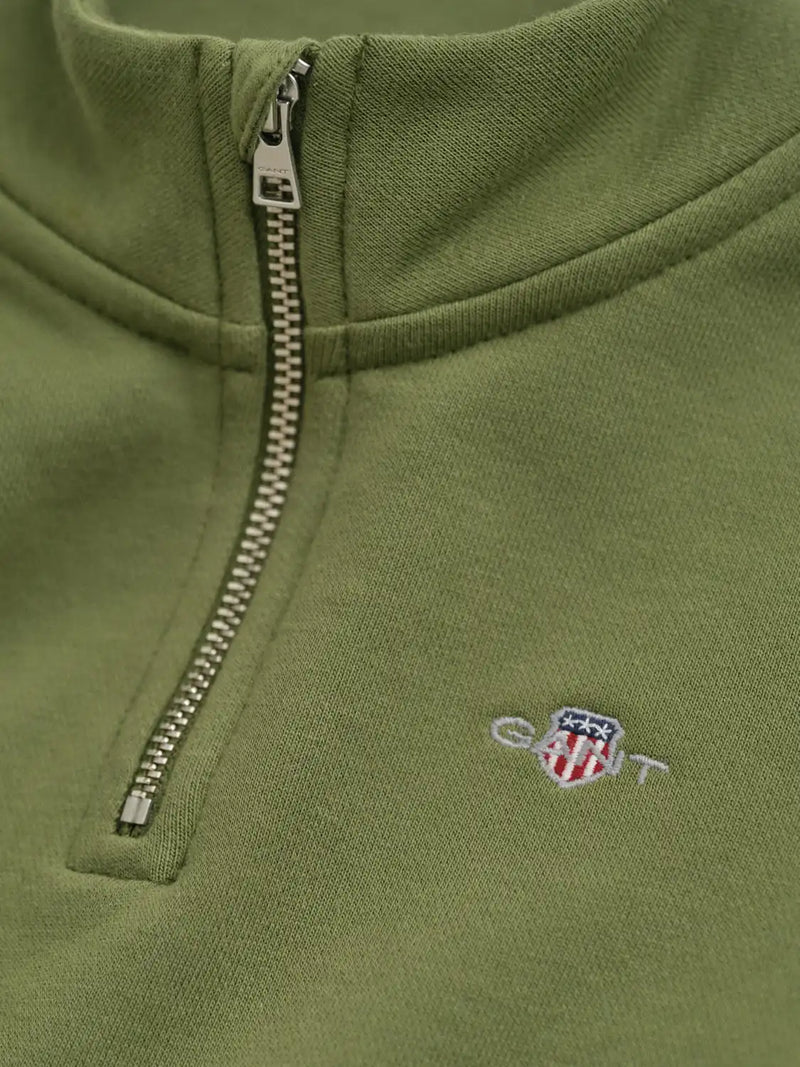 Closer view of the GANT half zip sweatshirt.