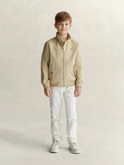 Boy modelling the tan harrington jacket by GANT.