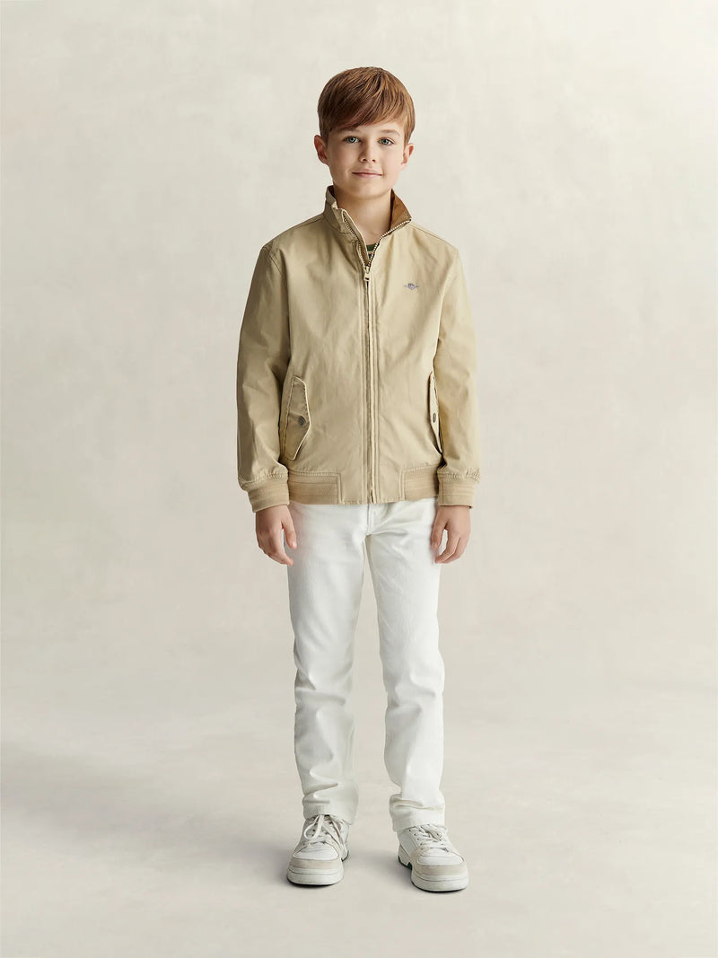 Boy modelling the tan harrington jacket by GANT.