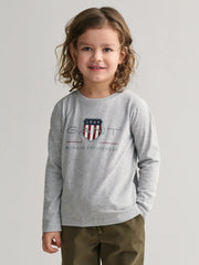 Boy wearing the GANT l/s archive shield t-shirt.