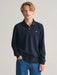 Boy wearing the GANT l/s rugby shirt.