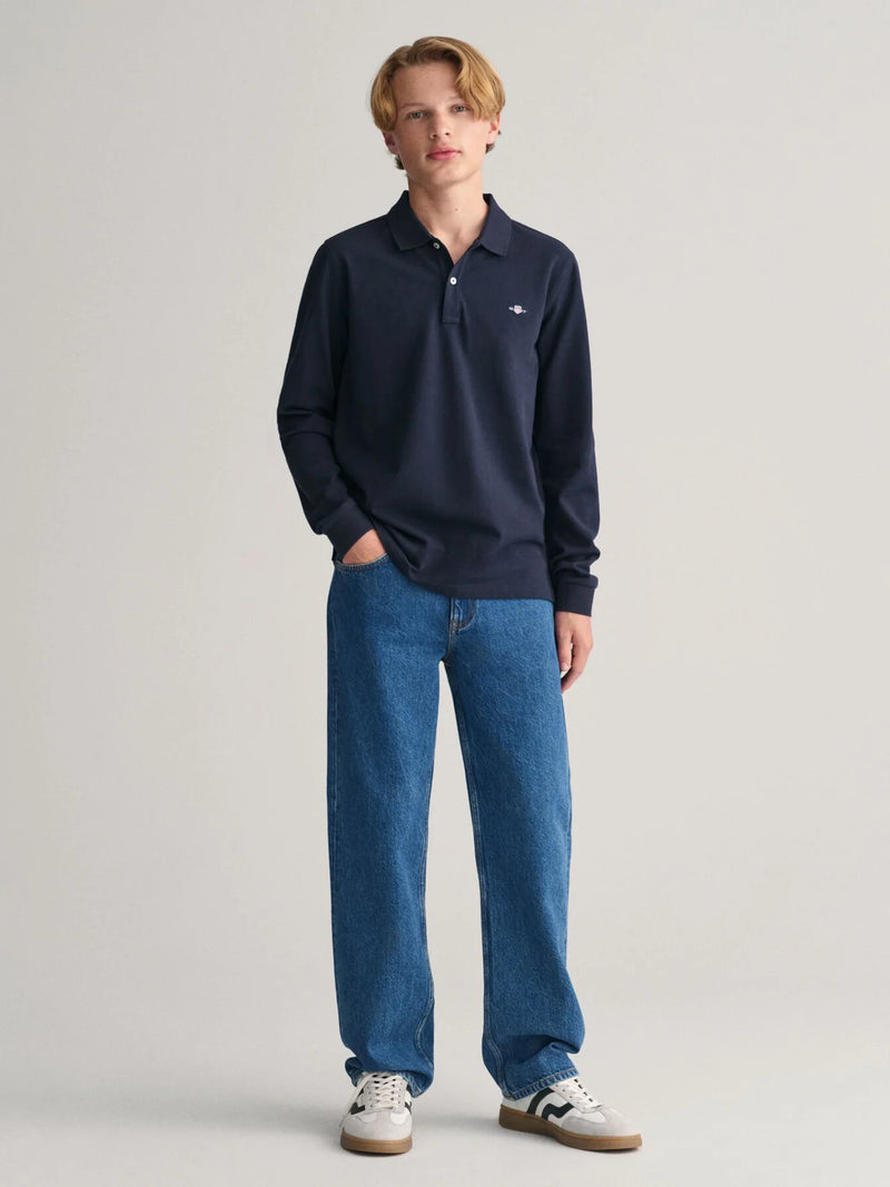 Boy modelling the GANT l/s rugby shirt.