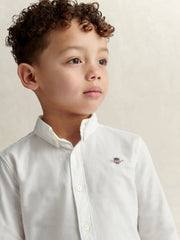 Closer look at the GANT oxford shirt showing detail of the embroidered logo.